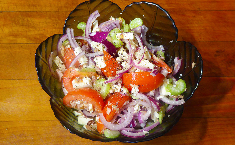 Tomato salad with tuna and cheese