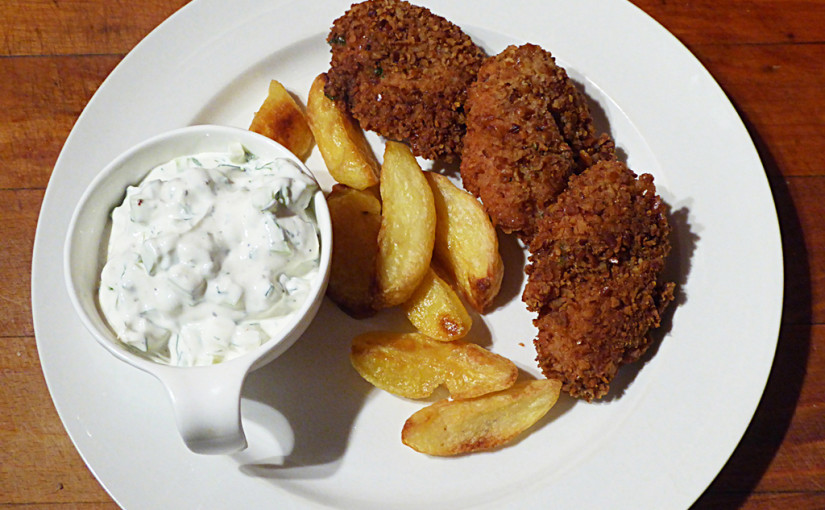 Chicken nuggets with pretzel crust and baked potatoes