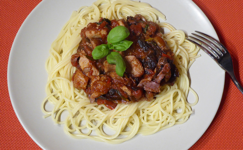 Serve with spaghetti, garnished with basil